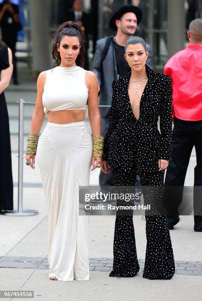 Kim Kardashian,Kourtney Kardashian are seen in Brooklyn on June 4, 2018 in New York City.