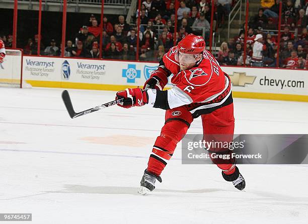 Tim Gleason of the Carolina Hurricanes shoots the puck during a NHL game against the Florida Panthers on February 9, 2010 at RBC Center in Raleigh,...