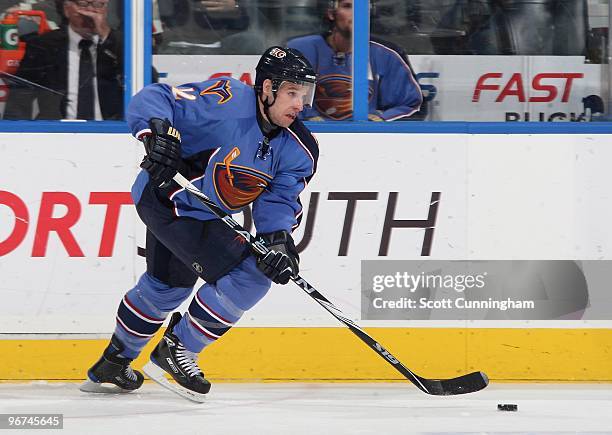 Todd White of the Atlanta Thrashers carries the puck against the Florida Panthers at Philips Arena on February 6, 2010 in Atlanta, Georgia.