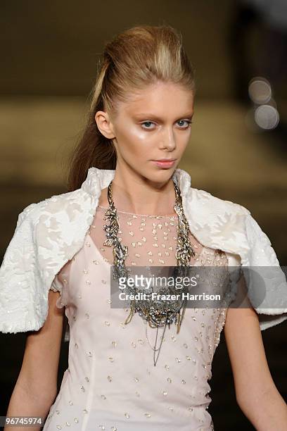 Model walks the runway at the Badgley Mischka Fall 2010 Fashion Show during Mercedes-Benz Fashion Week at The Tent at Bryant Park on February 16,...