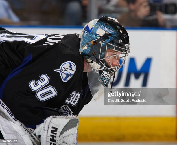 Goaltender Antero Niittymaki of the Tampa Bay Lightning defends the goal against the Vancouver Canucks at the St. Pete Times Forum on February 9,...