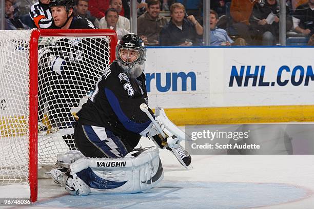 Goaltender Antero Niittymaki of the Tampa Bay Lightning defends the goal against the Vancouver Canucks at the St. Pete Times Forum on February 9,...