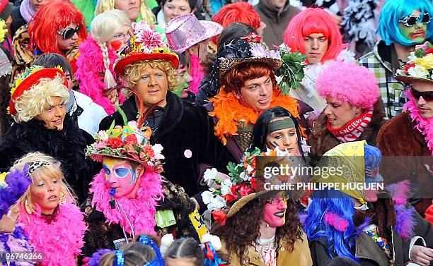 Several thousands disguised people parade in the streets of Dunkirk, on February 14 northern France, as part ot the town's carnival. AFP PHOTO...