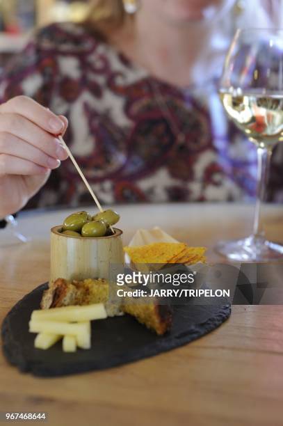 Drink and appetizer, Le Coup de Coeur wine bar and restaurant, Morzine ski resort, Portes du Soleil skiing area, region of Chablais, Haute-Savoie...