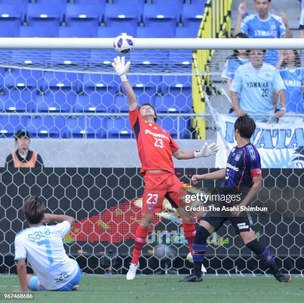 Mizuki Hayashi of Gamba Osaka makes a save during the J.League Levain Cup play-off first leg match between Gamba Osaka and Jubilo Iwata at Suita City...