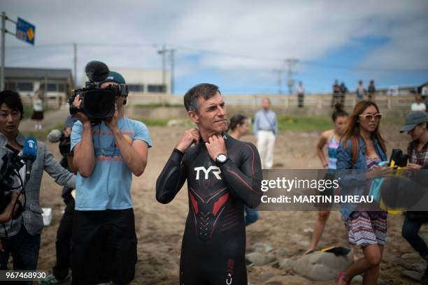 French marathon swimmer Benoit "Ben" Lecomte prepares himself in Choshi, Chiba prefecture on June 5, 2018 as he takes the start of his attempt of...