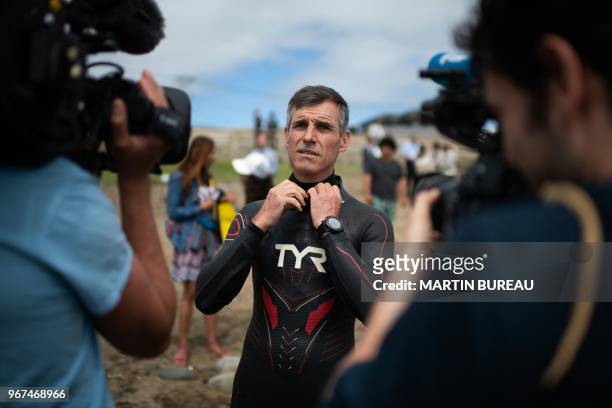French marathon swimmer Benoit "Ben" Lecomte prepares himself in Choshi, Chiba prefecture on June 5, 2018 as he takes the start of his attempt of...
