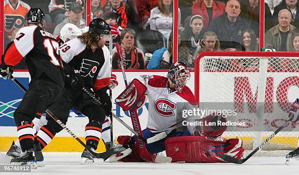 Scott Hartnell and Jeff Carter of the Philadelphia Flyers take a shot on goal against Carey Price of the Montreal Canadiens on February 12, 2010 at...