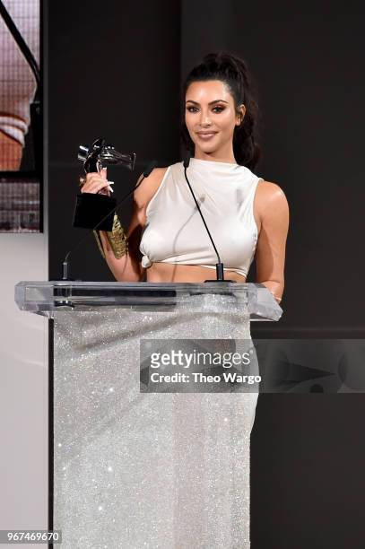 Kim Kardashian West accepts the 2018 CFDA Influencer Award onstage during the 2018 CFDA Fashion Awards at Brooklyn Museum on June 4, 2018 in New York...