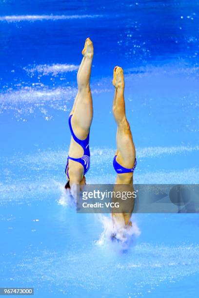 Si Yajie of China and Lian Junjie of China compete in the Mixed 10m Synchro Platform final on the opening day of the 21st FINA Diving World Cup 2018...