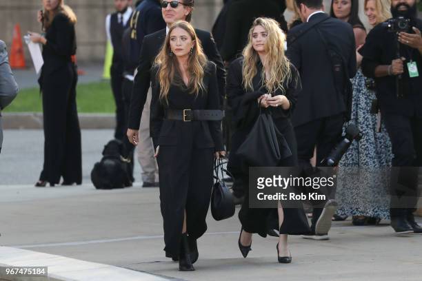 Mary-Kate Olsen and Ashley Olsen arrive for the 2018 CFDA Fashion Awards at Brooklyn Museum on June 4, 2018 in New York City.