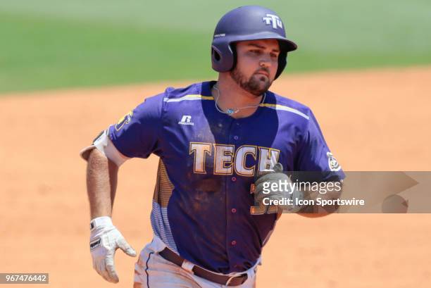 Tennessee Tech Golden Eagles first baseman Chase Chambers rounds the bases after hitting a solo home run during the Tennessee Tech Golden Eagles...