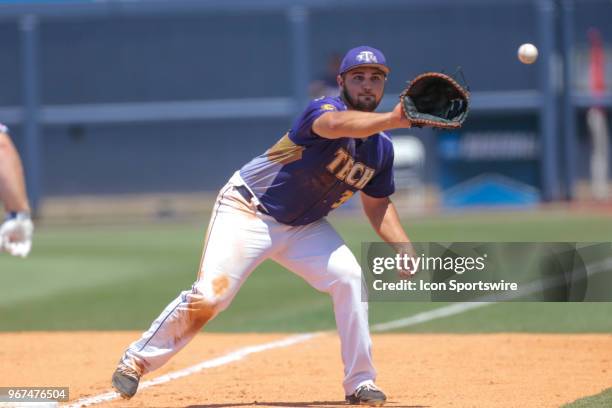 Tennessee Tech Golden Eagles first baseman Chase Chambers catches the throw for an out a first during the Tennessee Tech Golden Eagles versus...