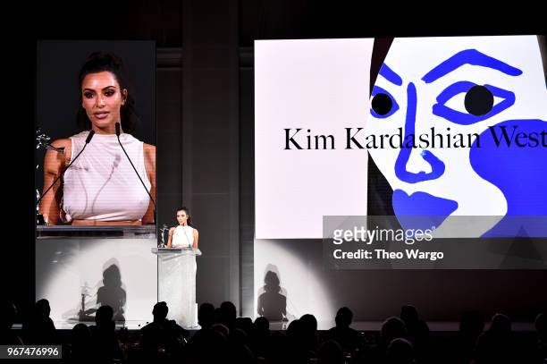 Kim Kardashian West accepts the 2018 CFDA Influencer Award onstage during the 2018 CFDA Fashion Awards at Brooklyn Museum on June 4, 2018 in New York...