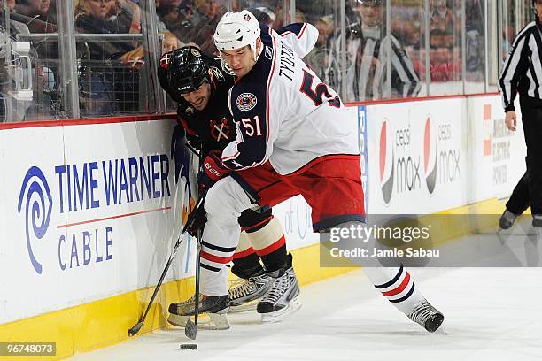 Defenseman Fedor Tyutin of the Columbus Blue Jackets skates with the puck against the Chicago Blackhawks on February 14, 2010 at Nationwide Arena in...