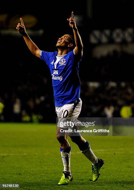 Steven Pienaar of Everton celebrates scoring the opening goal during the UEFA Europa League Round 32 first leg match between Everton and Sporting...