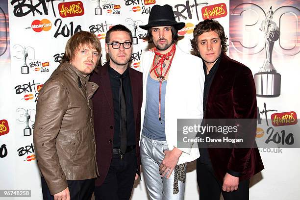 Chris Edwards, Tom Meighan, Sergio Pizzorno and Ian Matthews of Kasabian arrive at The Brit Awards 2010 held at Earls Court on February 16, 2010 in...