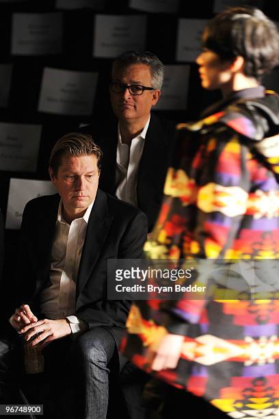 Designers James Mischka and Mark Badgley watch the rehersals before the Badgley Mischka Fall 2010 Fashion Show during Mercedes-Benz Fashion Week at...