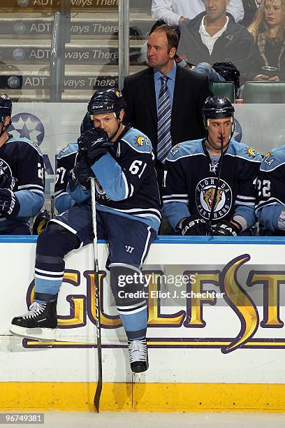 Cory Stillman of the Florida Panthers sits on the boards during a break in the play against the Boston Bruins at the BankAtlantic Center on February...