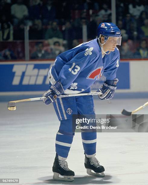 Mats Sundin of the Quebec Nordiques skates against the Montreal Canadiens in the early 1990's at the Montreal Forum in Montreal, Quebec, Canada.