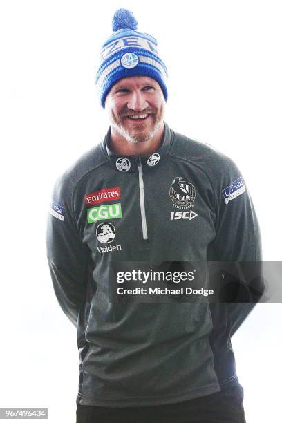 Magpies coach Nathan Buckley looks on during a media opportunity at the Holden Centre on June 5, 2018 in Melbourne, Australia. All AFL coaches will...