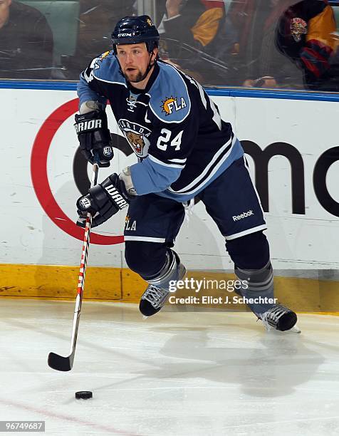 Bryan McCabe of the Florida Panthers skates with the puck against the Boston Bruins at the BankAtlantic Center on February 13, 2010 in Sunrise,...