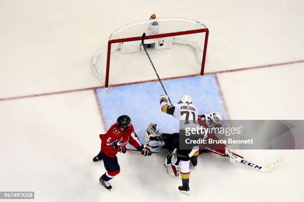 Reilly Smith of the Vegas Golden Knights scores a third-period goal past Braden Holtby of the Washington Capitals in Game Four of the 2018 NHL...