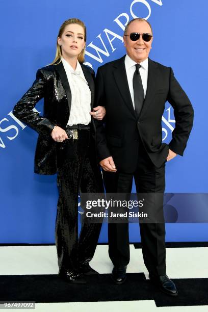 Amber Heard and Michael Kors attend the 2018 CFDA Fashion Awards at Brooklyn Museum on June 4, 2018 in New York City.