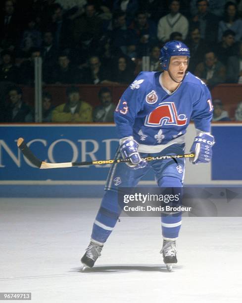 Mats Sundin of the Quebec Nordiques skates against the Montreal Canadiens in the early 1990's at the Montreal Forum in Montreal, Quebec, Canada.