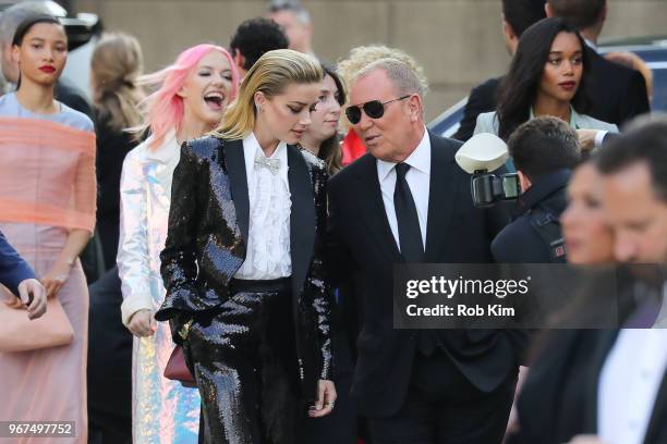 Amber Heard and Michael Kors arrive for the 2018 CFDA Fashion Awards at Brooklyn Museum on June 4, 2018 in New York City.