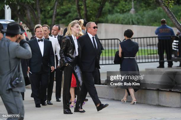 Amber Heard and Michael Kors arrive for the 2018 CFDA Fashion Awards at Brooklyn Museum on June 4, 2018 in New York City.