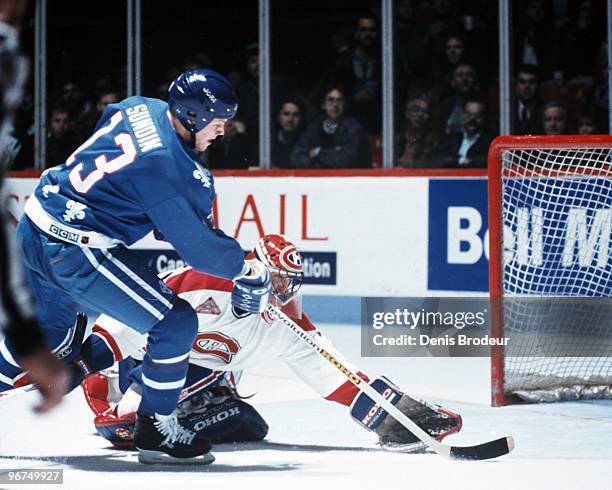 Mats Sundin of the Quebec Nordiques skates against Patrick Roy of the Montreal Canadiens in the early 1990's at the Montreal Forum in Montreal,...