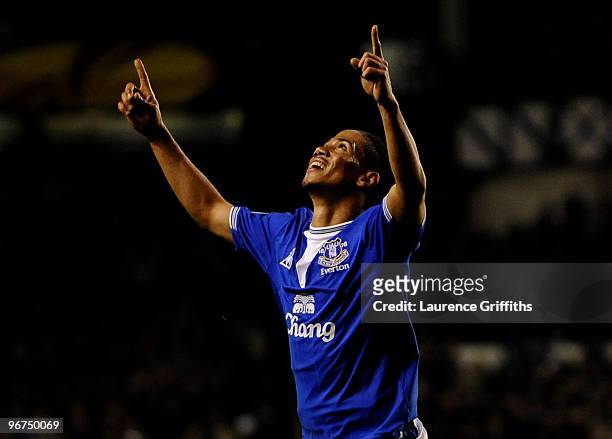 Steven Pienaar of Everton celebrates scoring the opening goal during the UEFA Europa League Round 32 first leg match between Everton and Sporting...