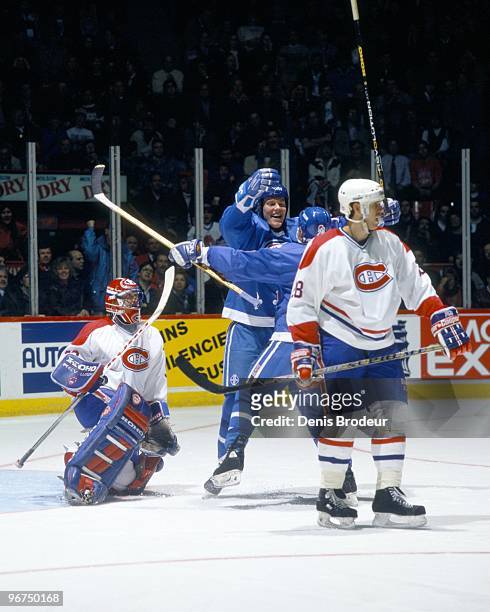Mats Sundin of the Quebec Nordiques and his teammate celebrate a goal against Patrick Roy of the Montreal Canadiens in the early 1990's at the...