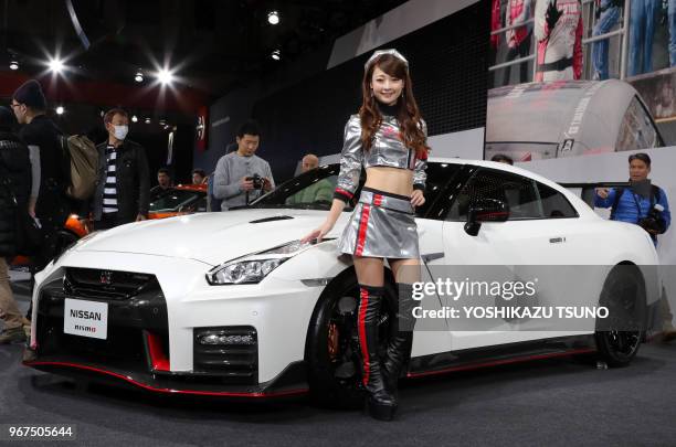 Model displays Nissan Motor's GT-R tuned by Nismo at the Tokyo Auto Salon 2017 in Chiba, suburban Tokyo on Friday, January 13, 2017.