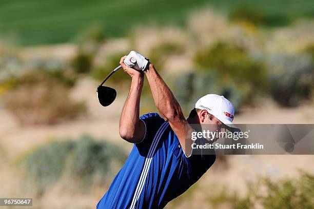Dustin Johnson tees off during the second practice round prior to the start of the Accenture Match Play Championship at the Ritz-Carlton Golf Club on...