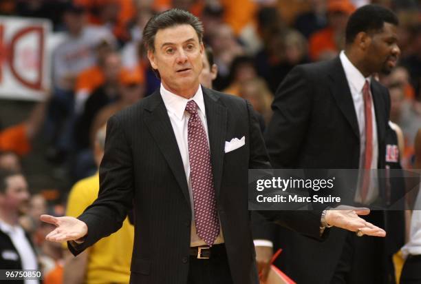 Coach Rick Pitino of the Louisville Cardinals yells to his team during the game against the Syracuse Orange at the Carrier Dome on February 14, 2010...