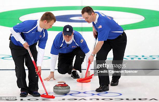 Skip John Shuster of the United States releases his stone during the men's curling round robin game between Germany and the United States on day 5 of...