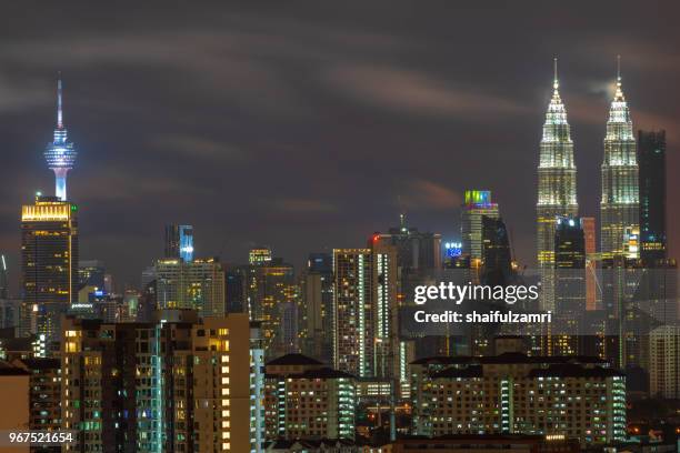 majestic night landscape of downtown kuala lumpur, malaysia - shaifulzamri stock pictures, royalty-free photos & images