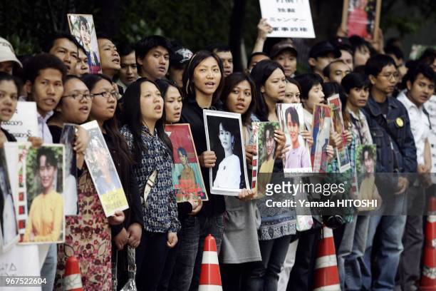 May 15, 2009 Tokyo A Myanmar citizen living in Japan holds a portrait of Aung San Suu Kyi during a rally in front of the Myanmar embassy in Tokyo on...