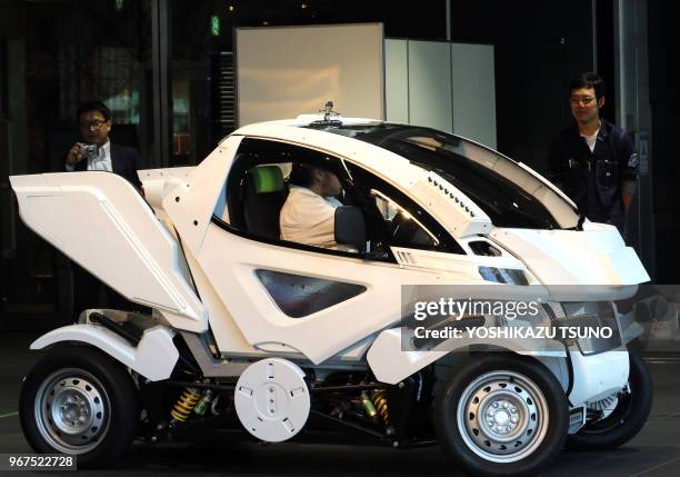 Japanese automobile venture Exmachina displays two-seater electric vehicle "Earth-1" which has four-wheel steering function at a press preview in...