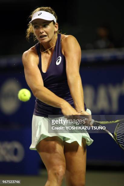 Coco Vandeweghe of the United States returns the ball during the first round of the Toray Pan Pacific Open tennis championships in Tokyo on September...