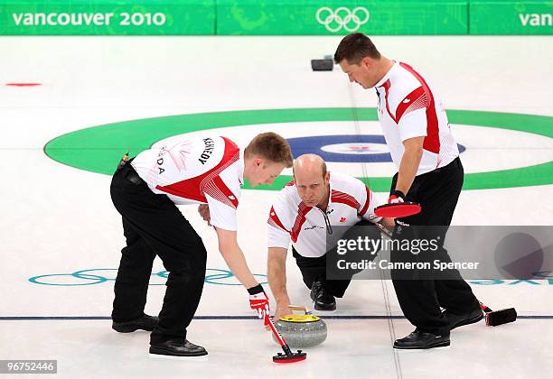 Skip Kevin Martin of Canada releases his stone during the men's curling round robin game between Canada and Norway on day 5 of the Vancouver 2010...