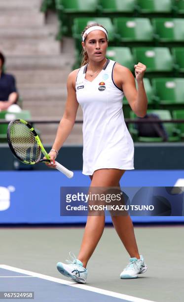 Rio de Janeiro Olympics gold medalist Monica Puig clinches her fist during the second round of the Toray Pan Pacific Open tennis championships in...