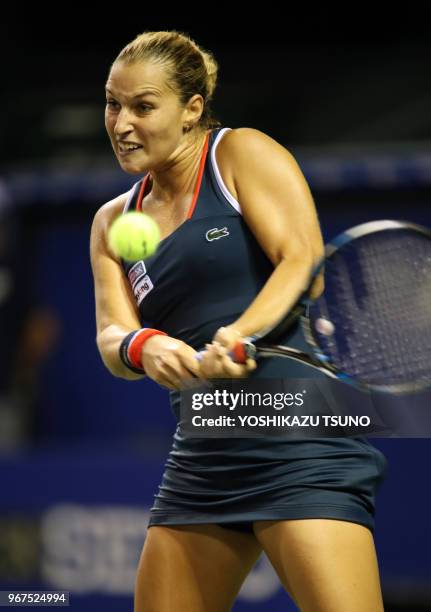 Slovakia's Dominika Cibulkova returns the ball during the first round of the Toray Pan Pacific Open tennis championships in Tokyo on September 20,...
