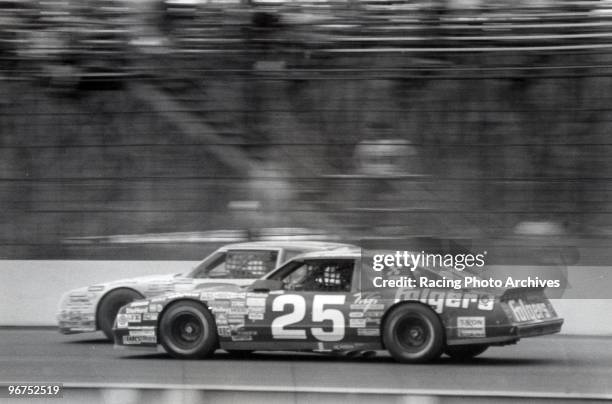 Tim Richmond fights of Dale Earnhardt for a victory at the Miller High Life 500.