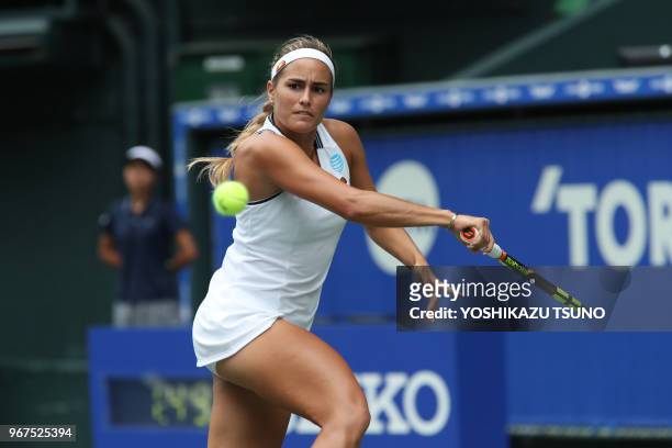 Rio de Janeiro Olympics gold medalist Monica Puig during the second round of the Toray Pan Pacific Open tennis championships in Tokyo on September...