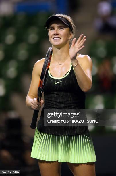Ukraine's Elina Svitolina smiles during the first round of the Toray Pan Pacific Open tennis championships in Tokyo on September 20, 2016. Svitolina...