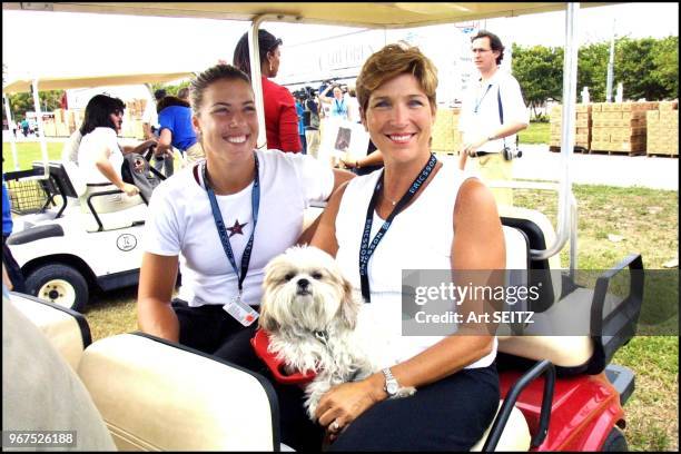 2001australian open champion Jennifer Capriati and mom denise with their l4 year old dog bianca at the Feed the Children Charity launch.