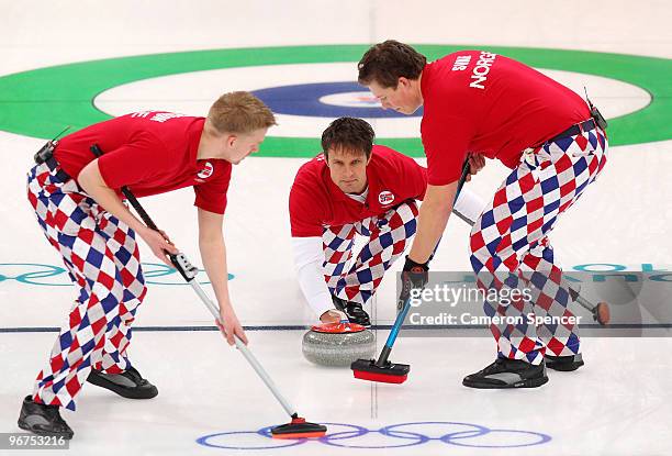 Skip Thomas Ulsrud of Norway releases his stone during the men's curling round robin game between Canada and Norway on day 5 of the Vancouver 2010...